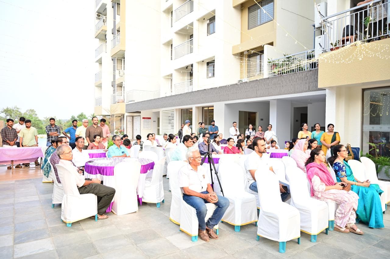 Residents seated in the courtyard during the Iftar Party gathering