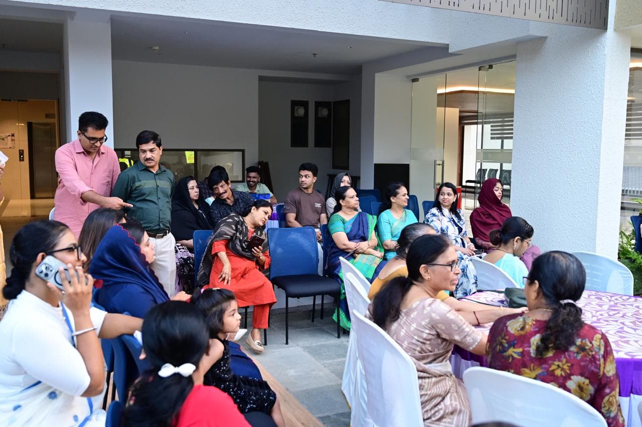 Audience section of residents enjoying the Iftar Party 2026 program