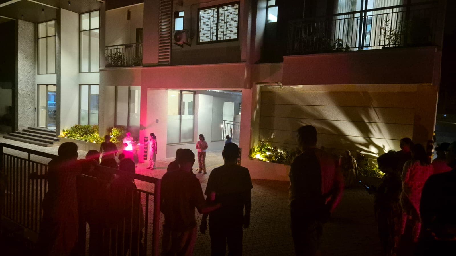 Residents gathering outdoors at night for Vishu Celebration 2026