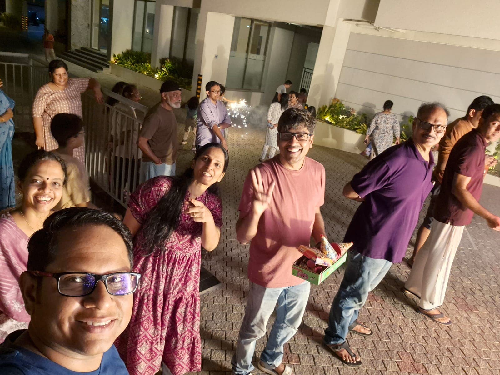 Group selfie of residents during the Vishu night celebration